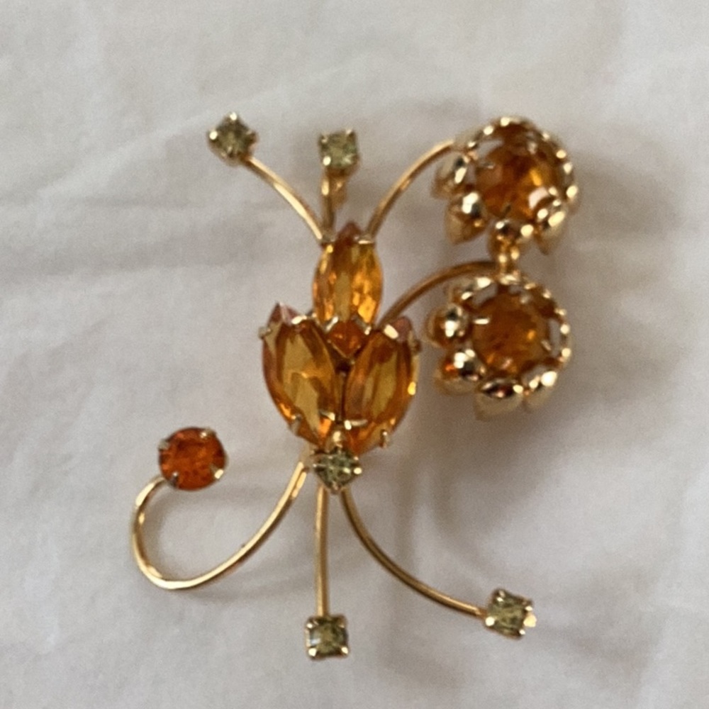 Golden brooch with topaz colored rhinestones - 2 1/2” long